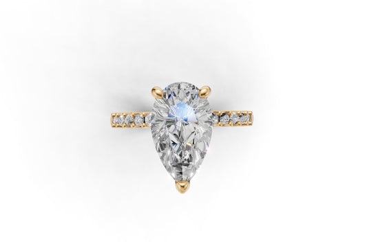 Pear Cut Diamond Engagement Ring with Shoulder Diamonds