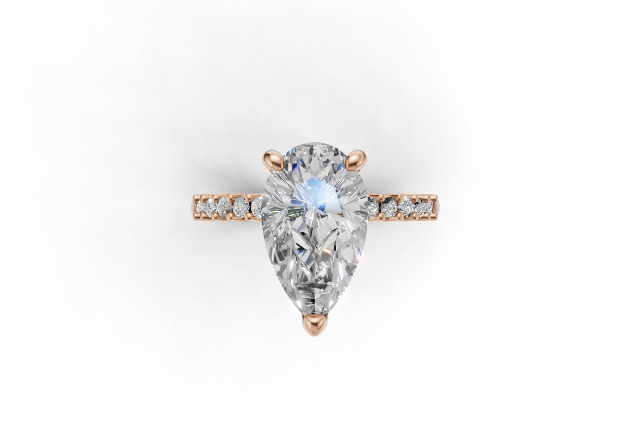 Pear Cut Diamond Engagement Ring with Shoulder Diamonds