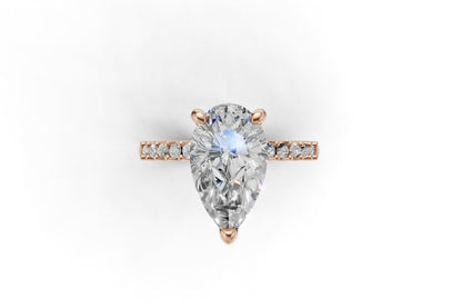 Pear Cut Diamond Engagement Ring with Shoulder Diamonds