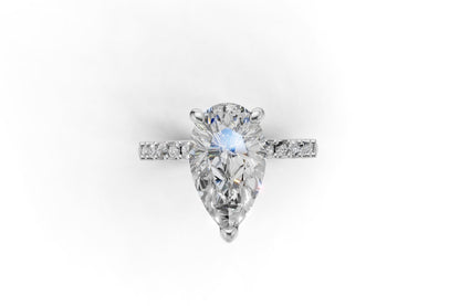 Pear Cut Diamond Engagement Ring with Shoulder Diamonds