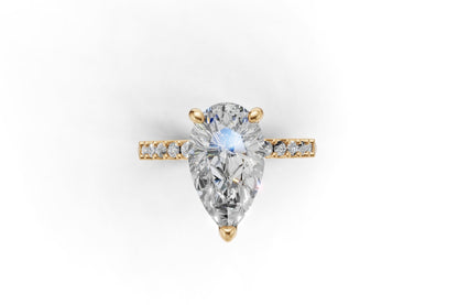Pear Cut Diamond Engagement Ring with Shoulder Diamonds